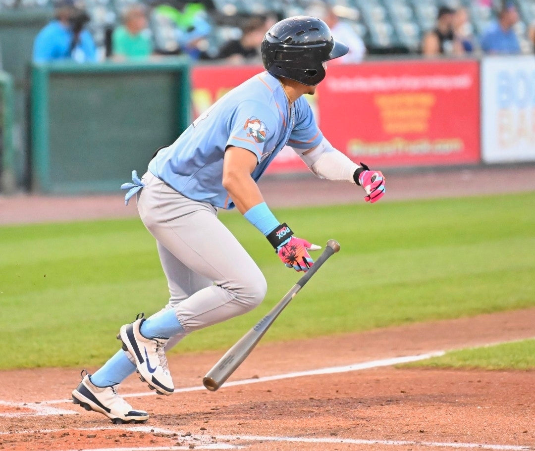 PGX Miami Vice Long Cuff Batting Gloves on-field lifestyle view